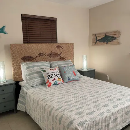 Coco NoKo cozy beach cottage + Swimming pool! Golf cart and pet friendly!