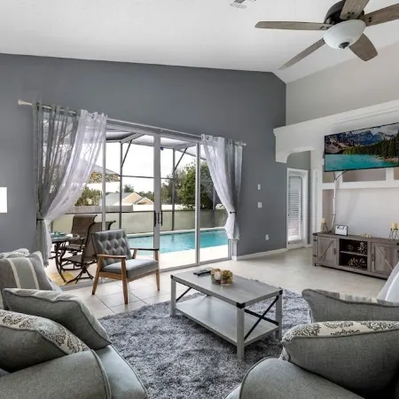 Lovely home near Disney with a Heated pool and game room in a resort community.