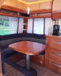 Chic caravan with awning on the Baltic Sea in Dierhagen