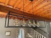 Provencal farmhouse on a hillside surrounded by centuries-old olive and oak trees