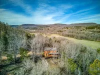 Pet-Friendly Peaceful Cabin Near River w/ Fire Pit + Hot Tub Sleeps 14