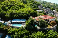 Habitation des Lauriers Отели в г. 