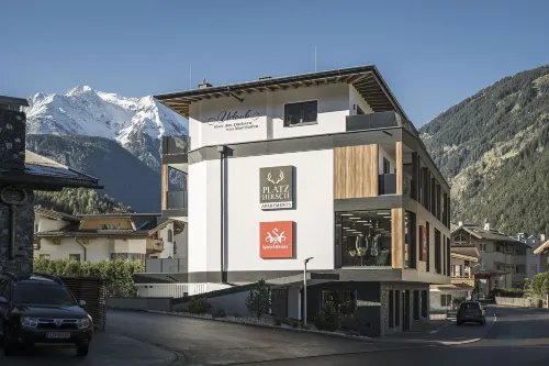 플라츠히어슈 아파트 & 마이어호펀 메이른호픈 호텔