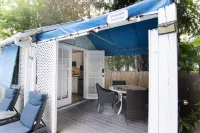 Cozy Poolside Cottage with Tropical Gardens - Charming Island Retreat