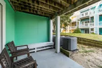 4-story dog-friendly home near beach with decks, pool, gym, washer/dryer, & AC