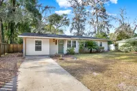 Spacious Backyard and Convenient Access - Charming Serene Retreat Hotels near Steeplechase Playground