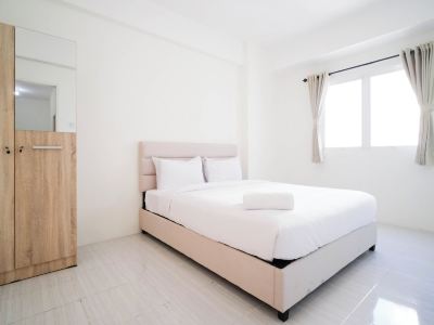 Best Choice and Homey 2Br at Puncak Dharmahusada Apartment