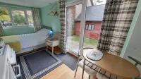 The Pines Cabin - Farm Park Stay Hotels in Mawr