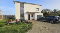 New house with small sea view close to the beach