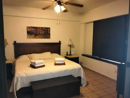 Condo at front of the beach inside a Resort compound hotel.