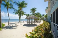 Stunning beachfront condo next to restaurant & a short drive to famous RumPoint