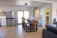 Spacious 4-Bedroom Retreat with Pool, Game Barn & Prime Location!