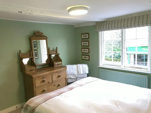 Landgate Cottage is opposite the 14th Century entrance to historic Rye town