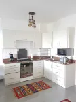 Cozy, family oriented & friendly apartment by the beach