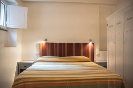 The Landing, in the heart of downtown, a stone's throw from ferry and main square Отели в г. Carloforte