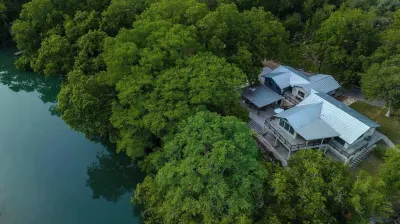 Luxury Riverfront Villa with Firepit & Gameroom! Hotels near Camp Fimfo Texas Hill Country