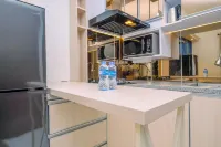 Simply Design 2BR at Podomoro Golf View Apartment By Travelio - 2-Star