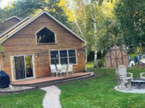 Spacious Summer Escape: Private Backyard, Dock & Fire Pit, Channel Waterfront Hotels in Breezy Point