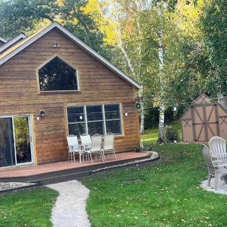 Spacious Summer Escape: Private Backyard, Dock & Fire Pit, Channel Waterfront
