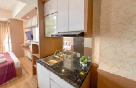 Minimalist Studio (No Kitchen) at Tamansari Prospero Sidoarjo Apartment By Travelio