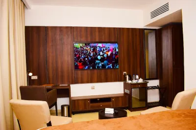 Monty Suites & Golf Hotels near Sufficient Grace Worship Centre
