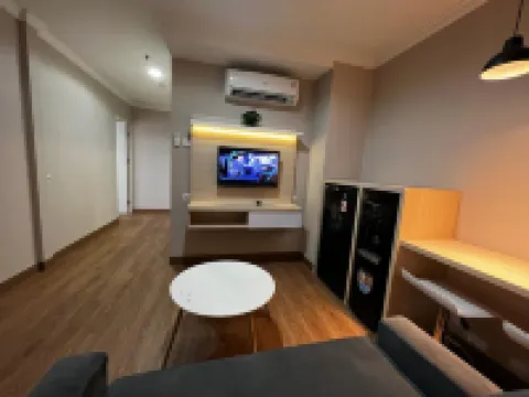 Sentul Tower Apartment by KASHI Room