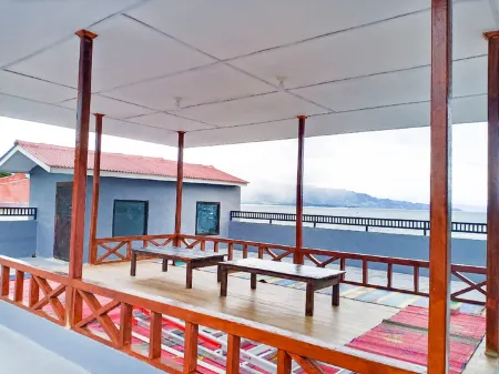 Blessing House Parapat Отели рядом с достопримечательностью «Pantai Bebas Parapat Danau Toba»