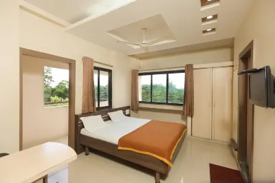 Hotel Sai Prarthana Hotels near Ganesh Mandir Patil Galli.