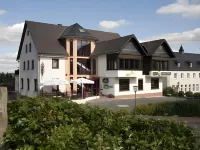 Haus Hubertus Hotels in der Nähe von Geschäftsstelle des NaturWanderpark delux (c/o Eifel Tourismus GmbH)