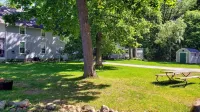 Lake George cottage with large lakefront lawn