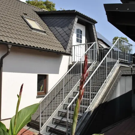 idyllic, sunny apartment at the natural swimming pond and with a fireplace