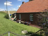 Four stars at the harbor: Modern renovated fisherman's house directly at the Ditzumer harbor