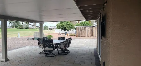 Relax & Enjoy the sun on the Covered  Patio & Golf Course View