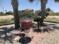 TROUT Steps to beach. Lovely two bedroom with screened porch and pool.