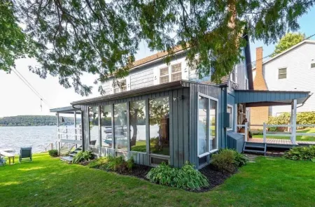 Lakefront Home With Island View Отели в г. Отсего