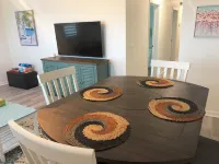 Very stylish and modern first-floor 2-bedroom unit with ocean views galore!