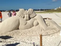 Come make a snowman out of sand in warm, sunny Florida!