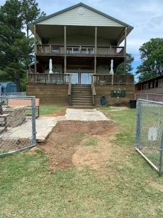 Waterfront Lake Home at Duchess Creek Estates with boat dock on Lake Eufaula, OK