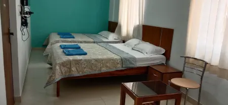 Sri Sai Palace Отели рядом с достопримечательностью «Karnataka Sangha»