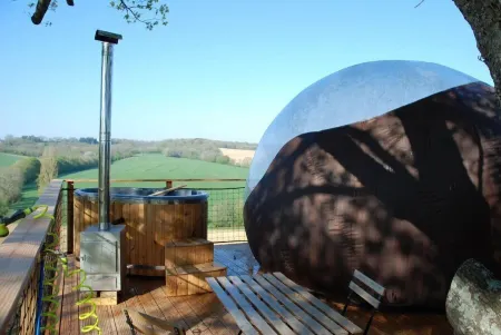 Les Bulles perchées de Lartigue Отели в г. Люпьяк