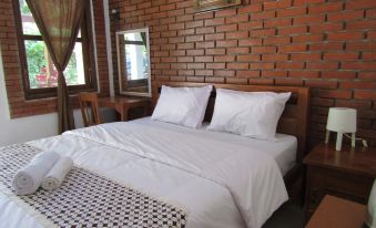 Penginapan Udin Syariah Bukit Rhema by Zuzu