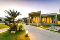 Tana Beach Villas Hotels in Lian
