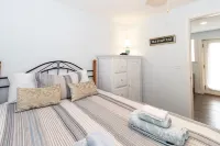 Spacious Fenced Backyard and Cozy Living Area - Charming Escape