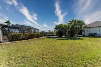 Screened Porch with Canal View and Games - Charming Vintage Oasis