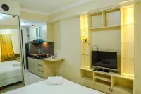 Modern Studio Grand Serpong Apartment by Travelio