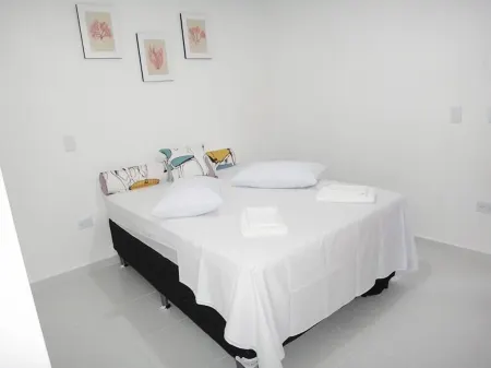 Urbano Suítes Отели рядом с достопримечательностью «Ubatuba Bus Station»