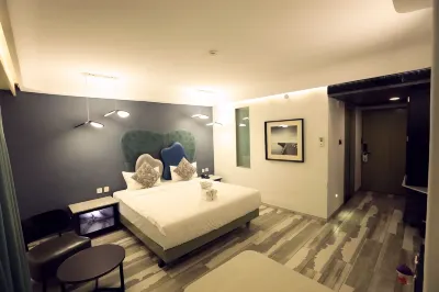 Humming Bird Hotel & Banquet Hotels near VRYM Garba Ground, Anand