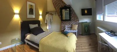 Les Chambres d'Hotes du Palais Отели в г. Эстре