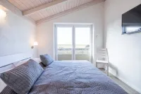 Exklusiv Eingerichtetes Ferienhaus in Strandnaehe