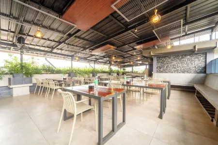 Treebo MR Motel Отели рядом с достопримечательностью «Uchatthu Kayam Riverside Picnic Spot»